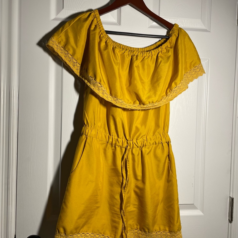 size medium yellow romper. perfect condition. not stretchy. ask for details.